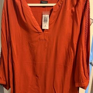 108- NWT- lace sleeve torrid size 3 Orange Blouse